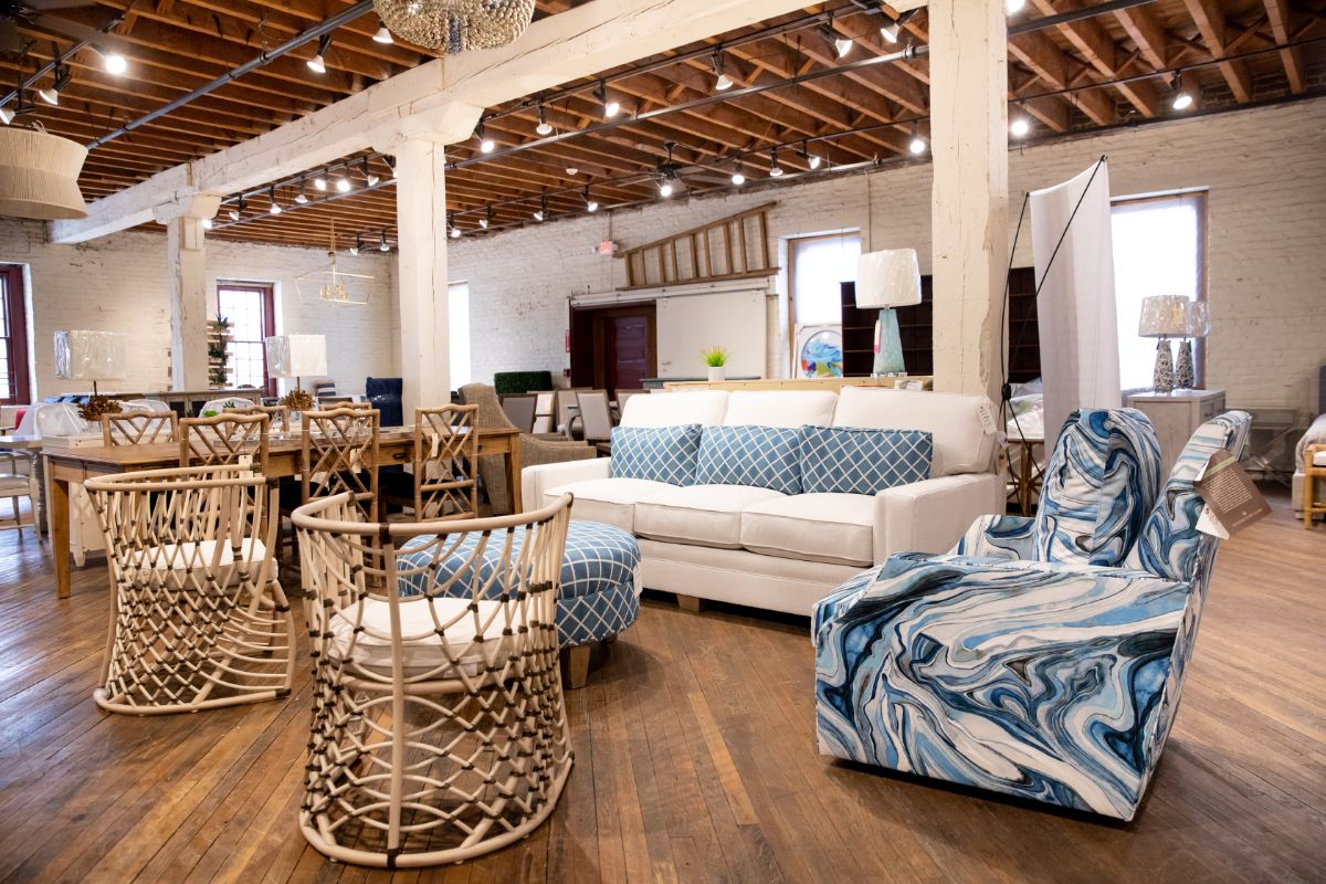 Coastal style furniture from a Virginia and North Carolina furniture store with woven chairs and upholstered sofa