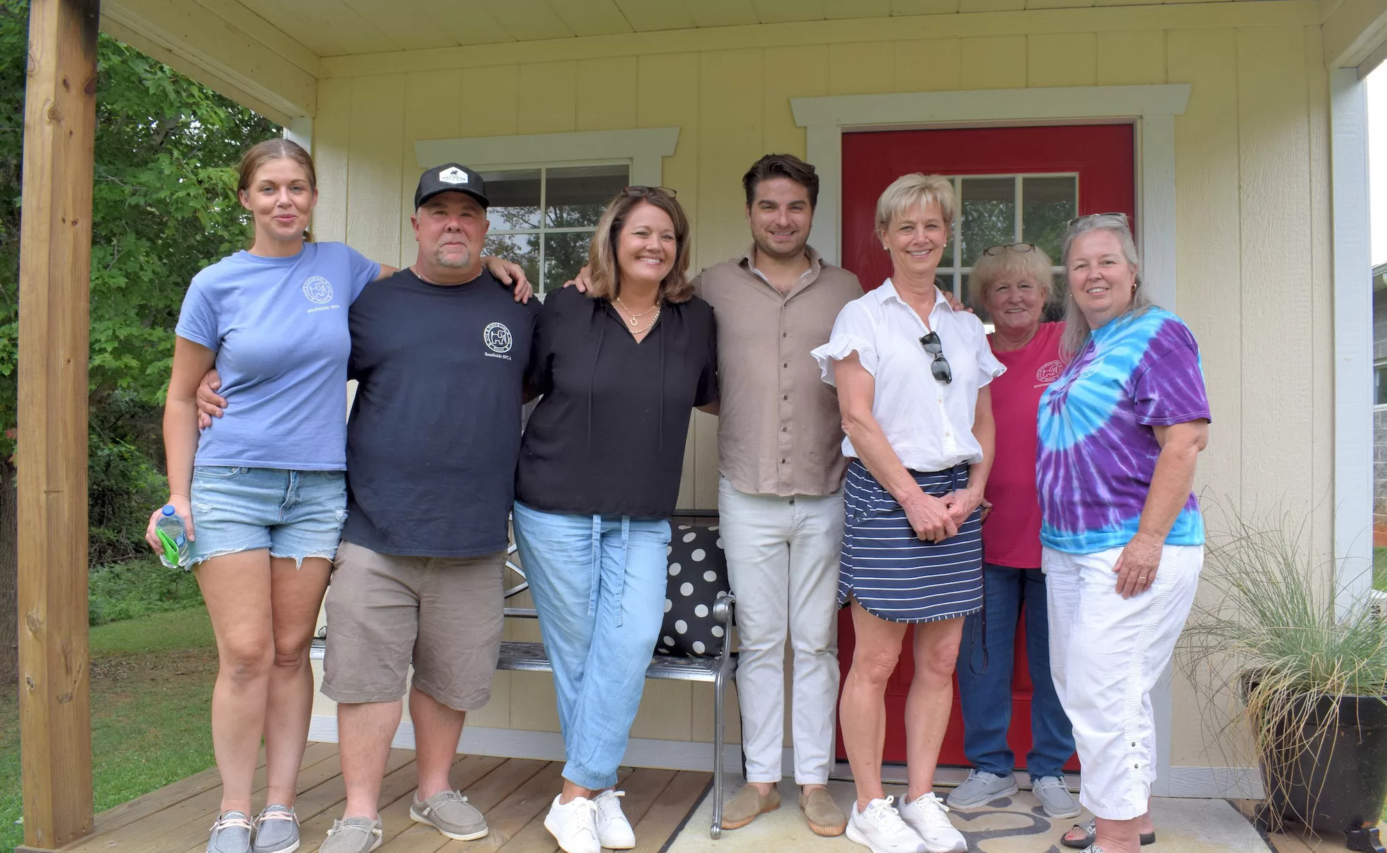 Green Front Furniture team with SouthSide SPCA volunteers at Virginia community event.