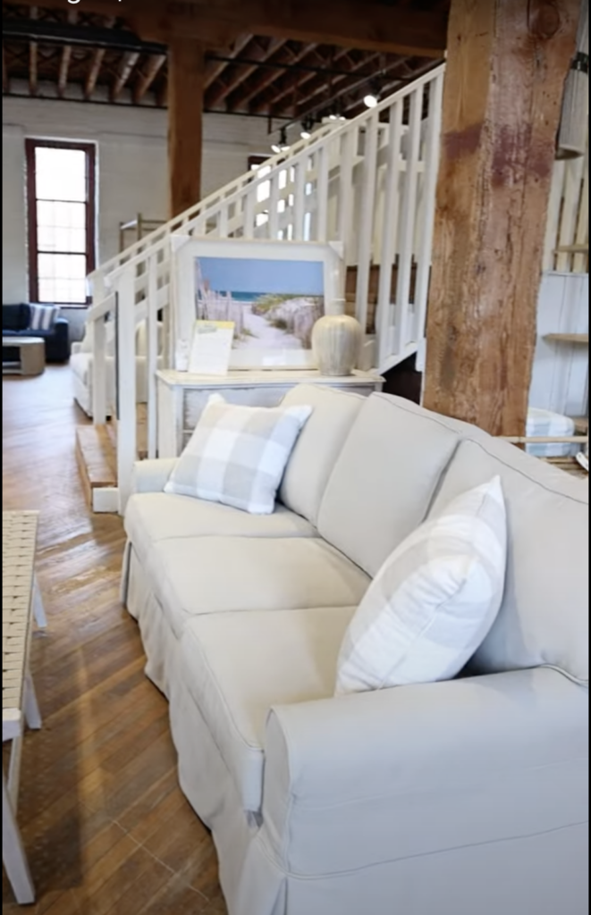 Coastal furniture and sofa with pillow from a furniture stores Virginia outdoor furniture collections featuring coastal outdoor furniture and American made furniture
