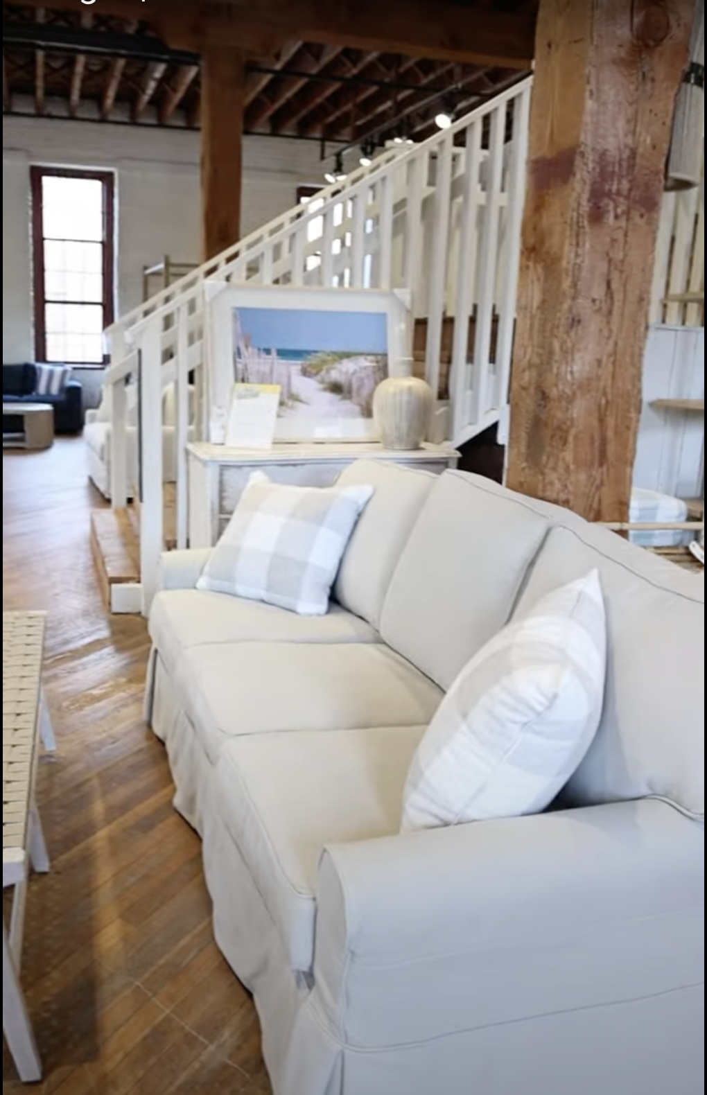 Coastal furniture and sofa with pillow from a furniture stores Virginia outdoor furniture collections featuring coastal outdoor furniture and American made furniture