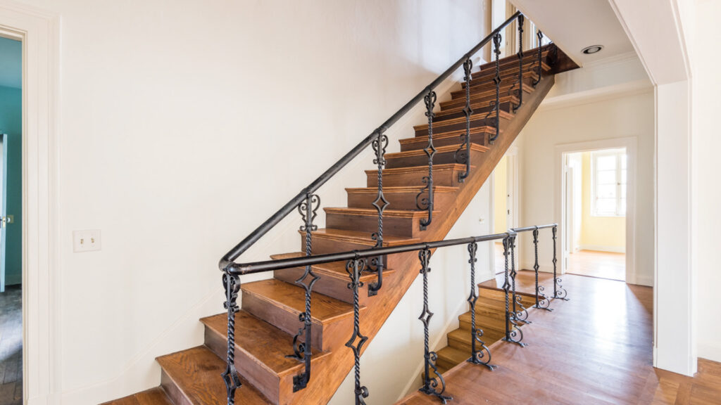 Historic dumbwaiter lift in a home renovation done by a Virginia furniture store with a curated furniture selection of craftsman furniture.