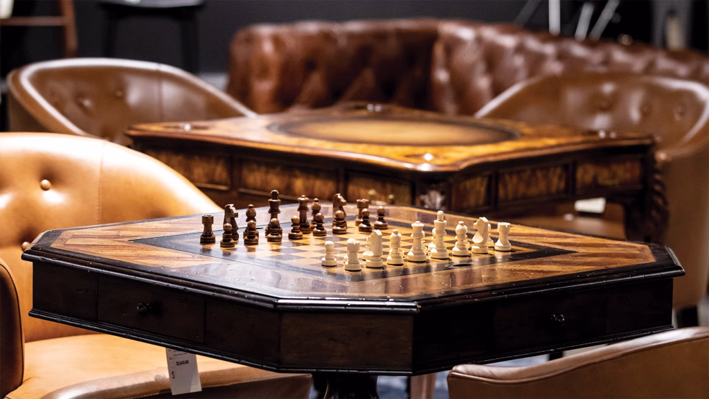 Alexa Hampton's wooden handcrafted furniture and game table add a luxe touch from a Virginia furniture store that sells American made furniture