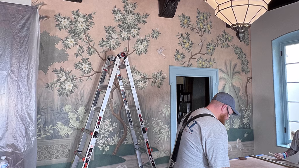Interior renovation of historic home with vintage wallpaper progress